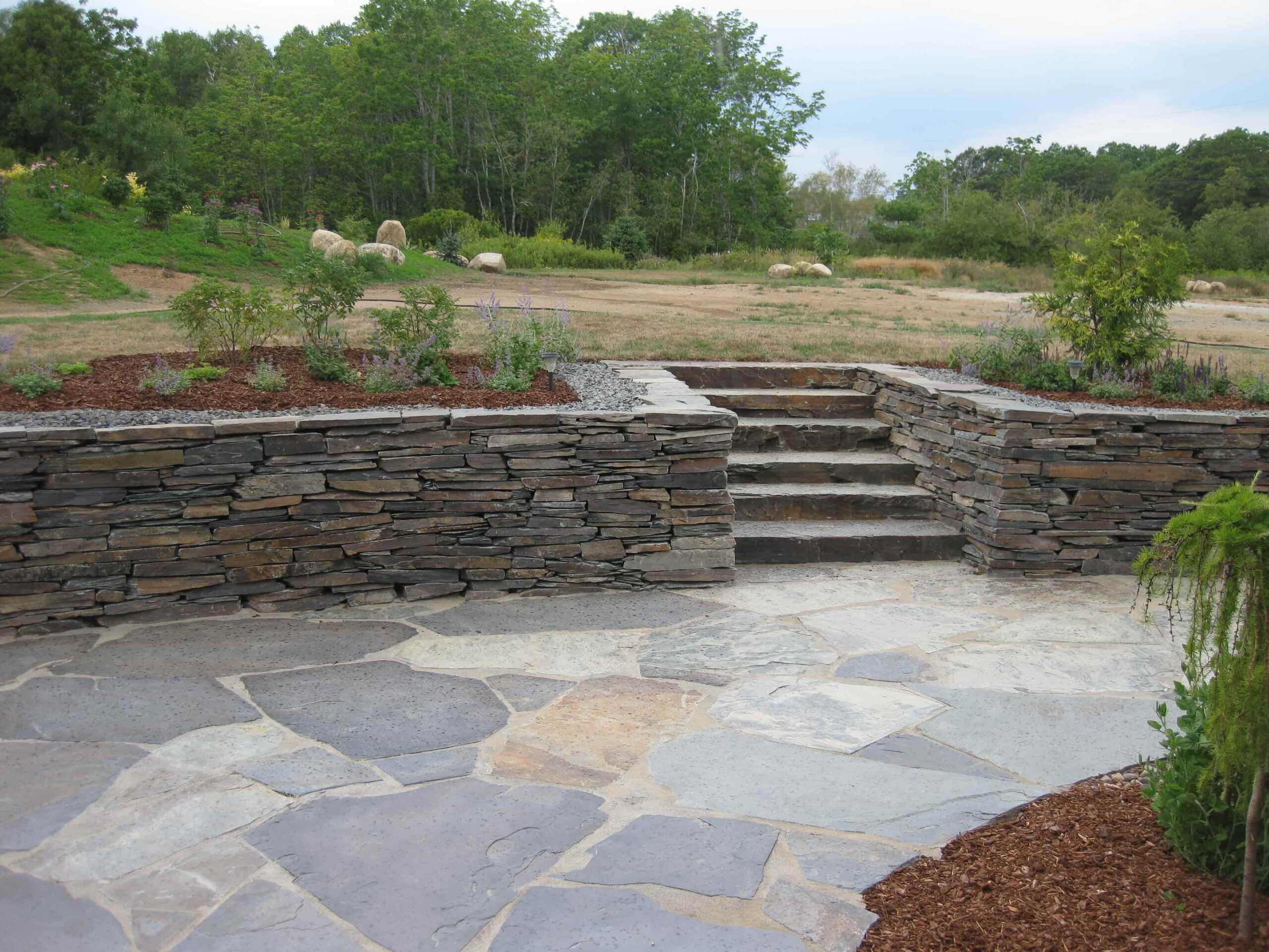 A stone path with stairs leading to higher ground