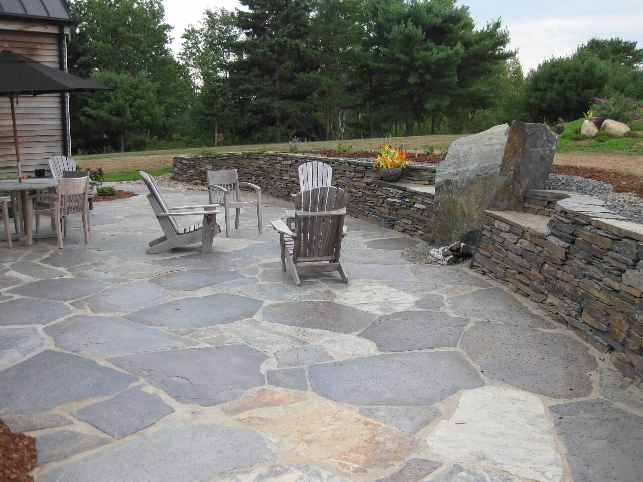 Outdoor seating area with stone flooring